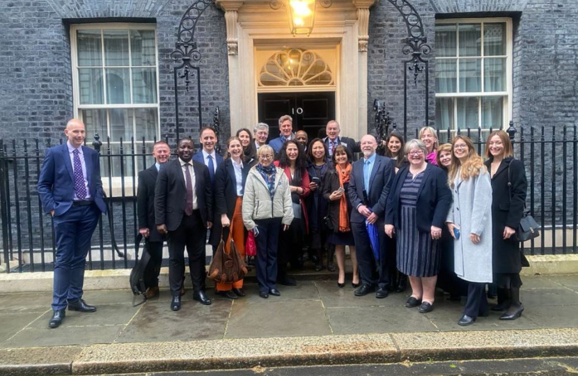 Therese and other attendees outside number 10