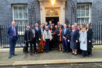 Therese and other attendees outside number 10