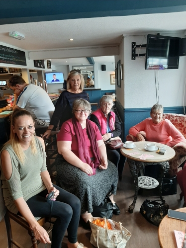 Therese with locals at the Falcon Inn